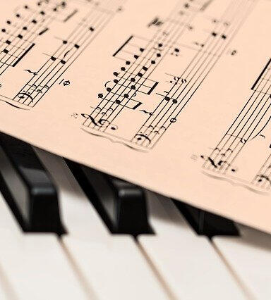 Piano keys and sheet music